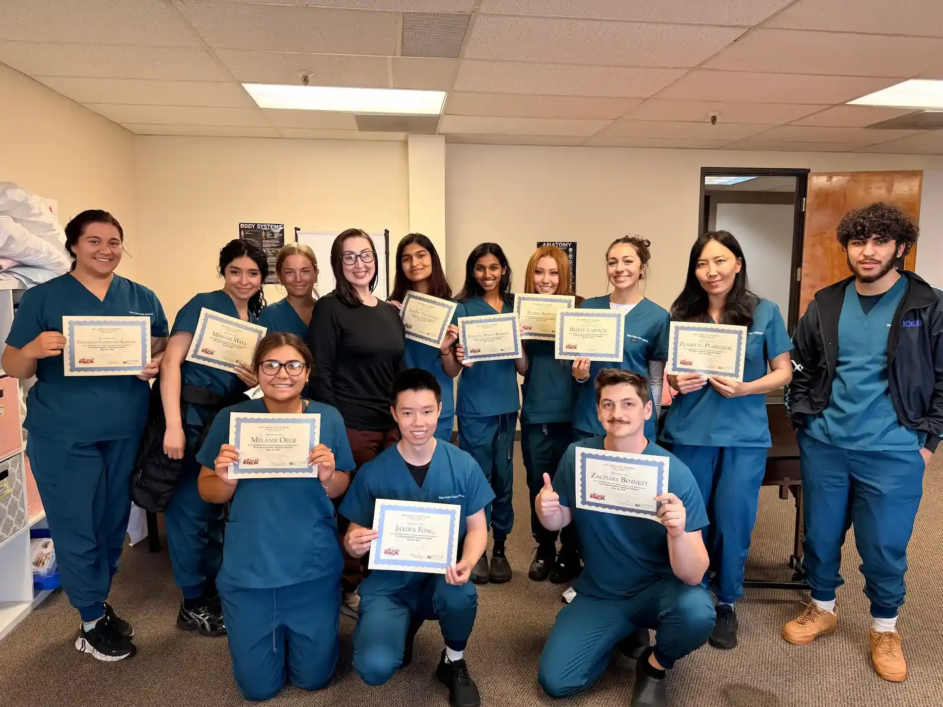 Graduation photo in the Bay Area CNA School skills lab