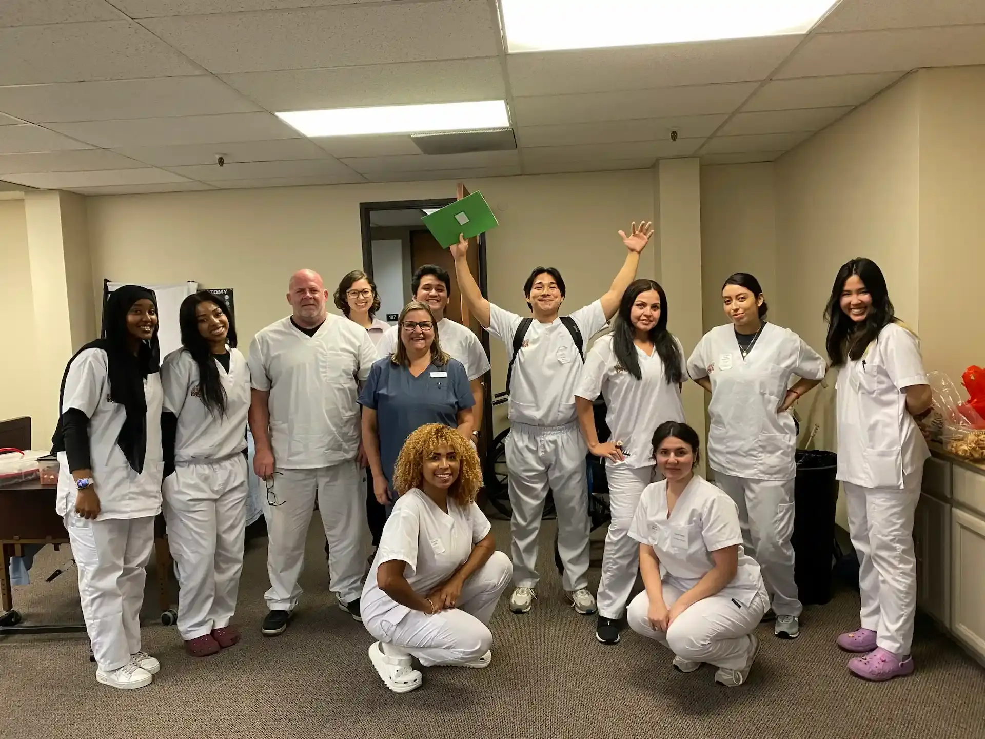 CNA graduates celebrating their certification